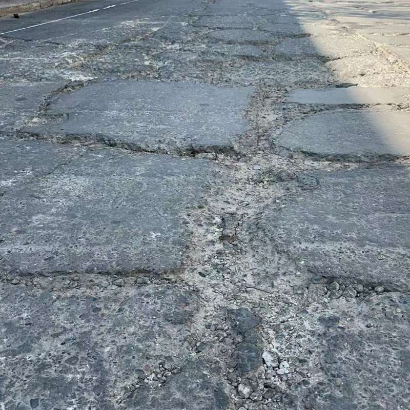 瑞昌路面起砂露石子修补料